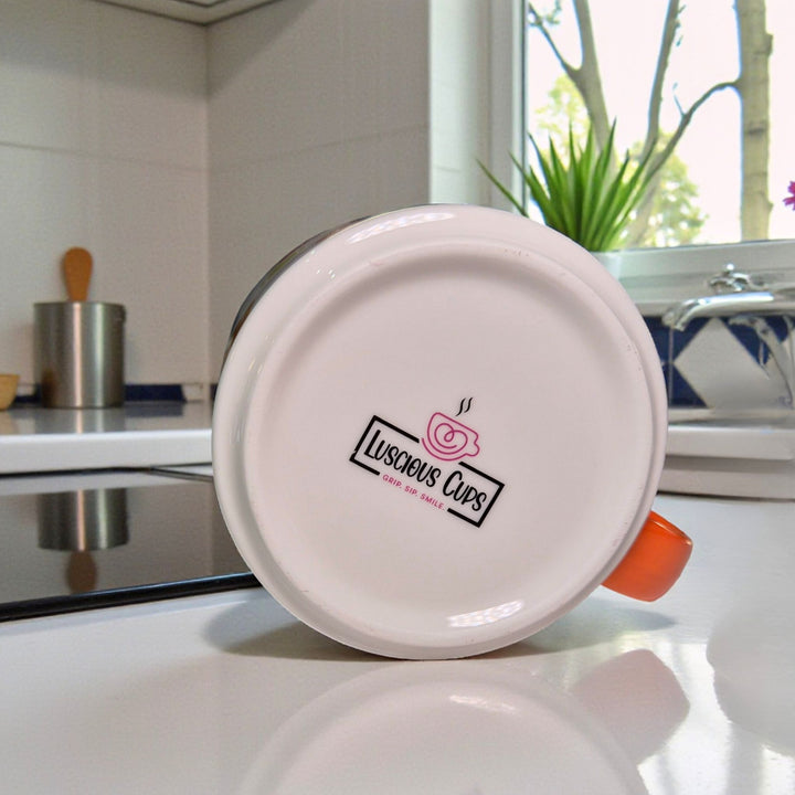 White mug with 'Luscious Cups' logo on a kitchen counter