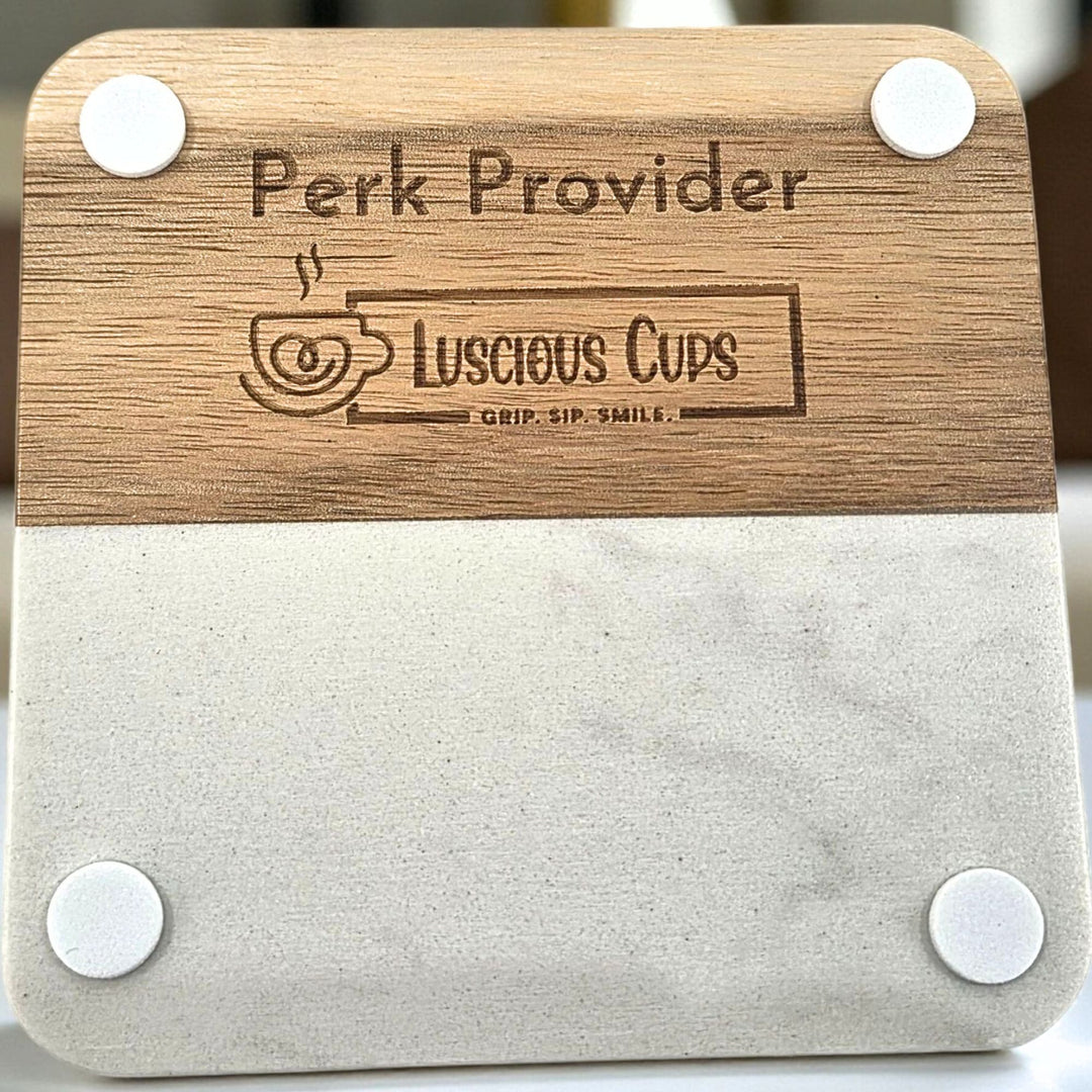 Sqaure wood and faux marble coaster with with 'Perk Provider' and 'Luscious Cups' branding